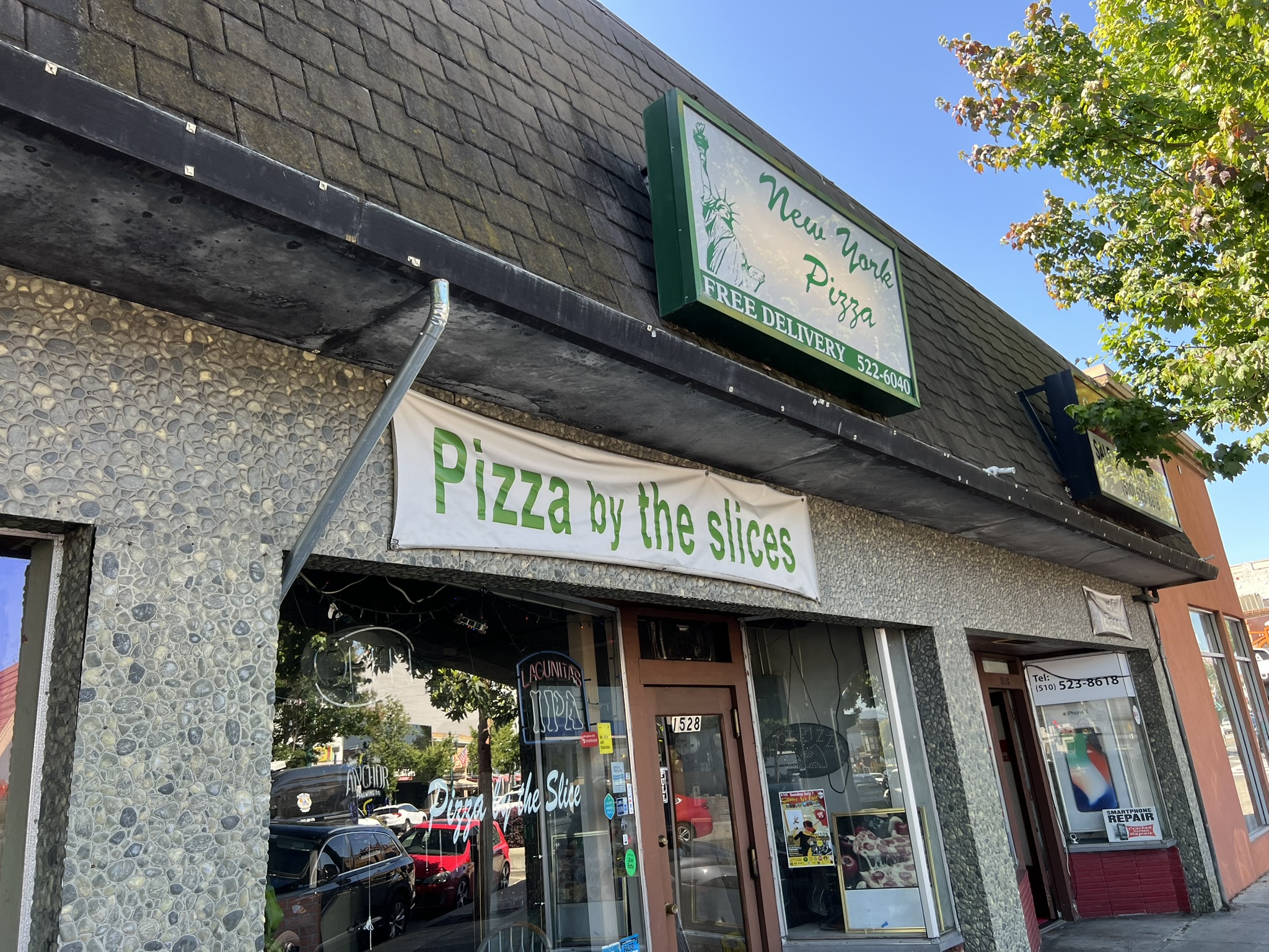 这条街上 Pizza 店不下七八家